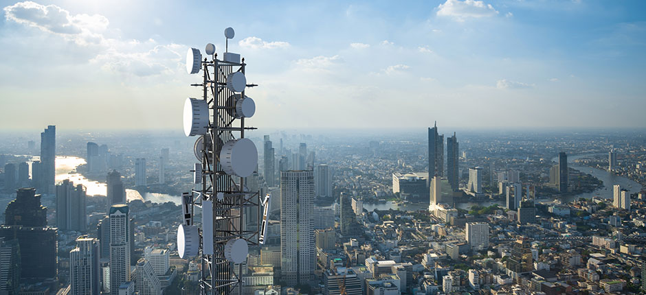 A 5G tower overlooking a major city