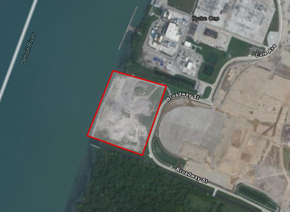Aerial photograph showing the industrial vacant land for sale at 120 Broadway Street, Windsor, which is adjacent to the Detroit River.