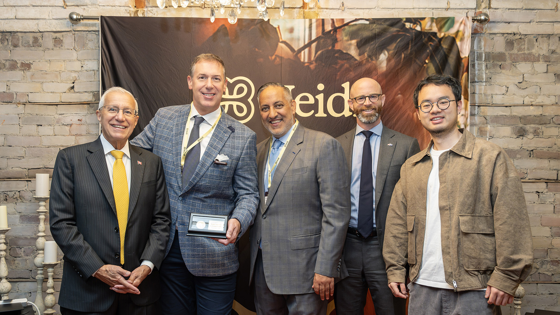 Group photo featuring, from left to right: Minister Vic Fedeli; Mark Leno, General Manager, Heidi Canada; Khawar Nasim, CEO, Invest Ontario; Garrett Tone, Executive Director, Life Sciences, Invest Ontario; and Yu Liu, Co-Founder and CTO, Heidi.