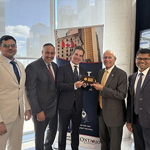 Minister Fedeli and the Invest Ontario team present Generation Mining CEO Jamie Levy with a commemorative plaque.