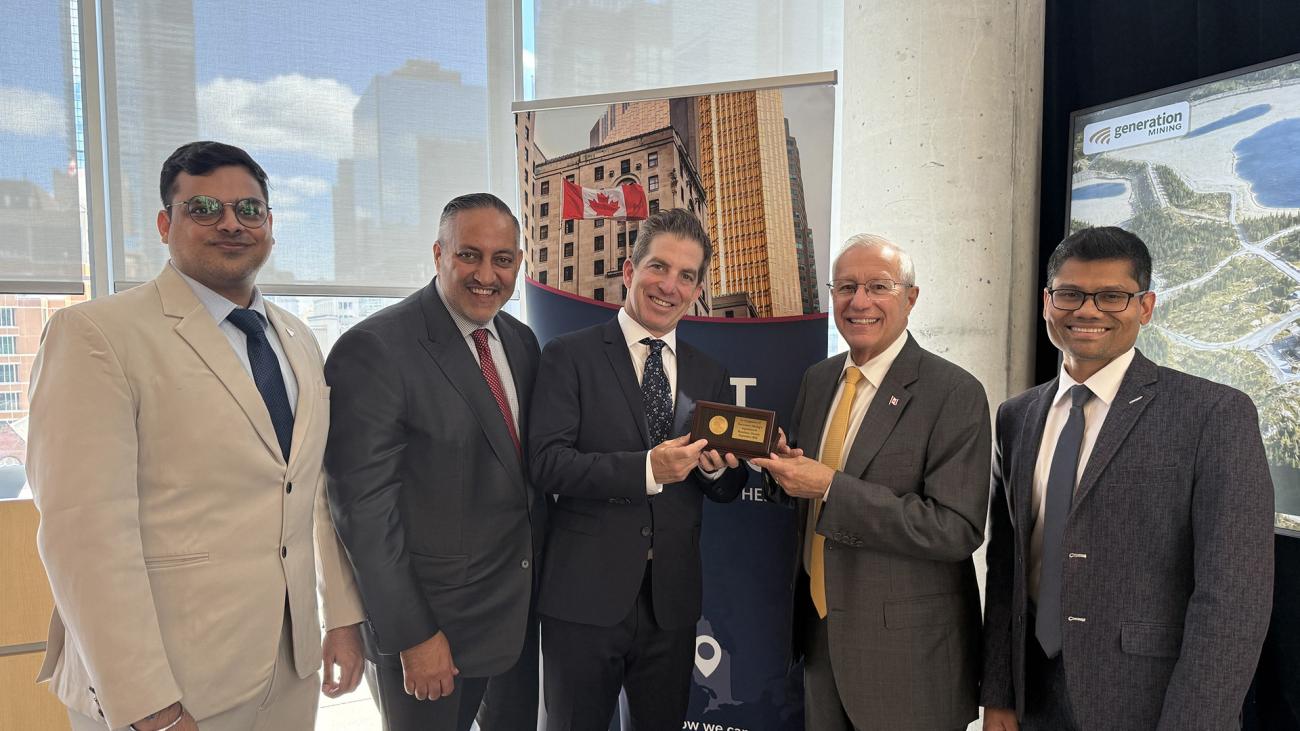 Minister Fedeli and the Invest Ontario team present Generation Mining CEO Jamie Levy with a commemorative plaque.