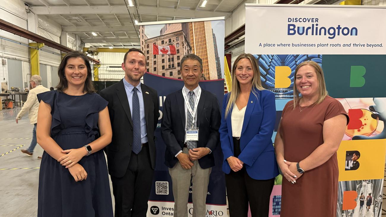 SCMS CEO Masatoshi Kifuji (center) poses with IvO representatives Marine Lochon, Theodore Aust, Nicole Simone, and Heather Potter.