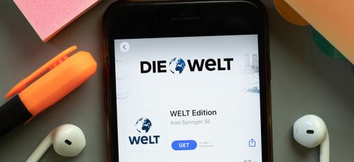 A cell phone with an image of the Die Welt app